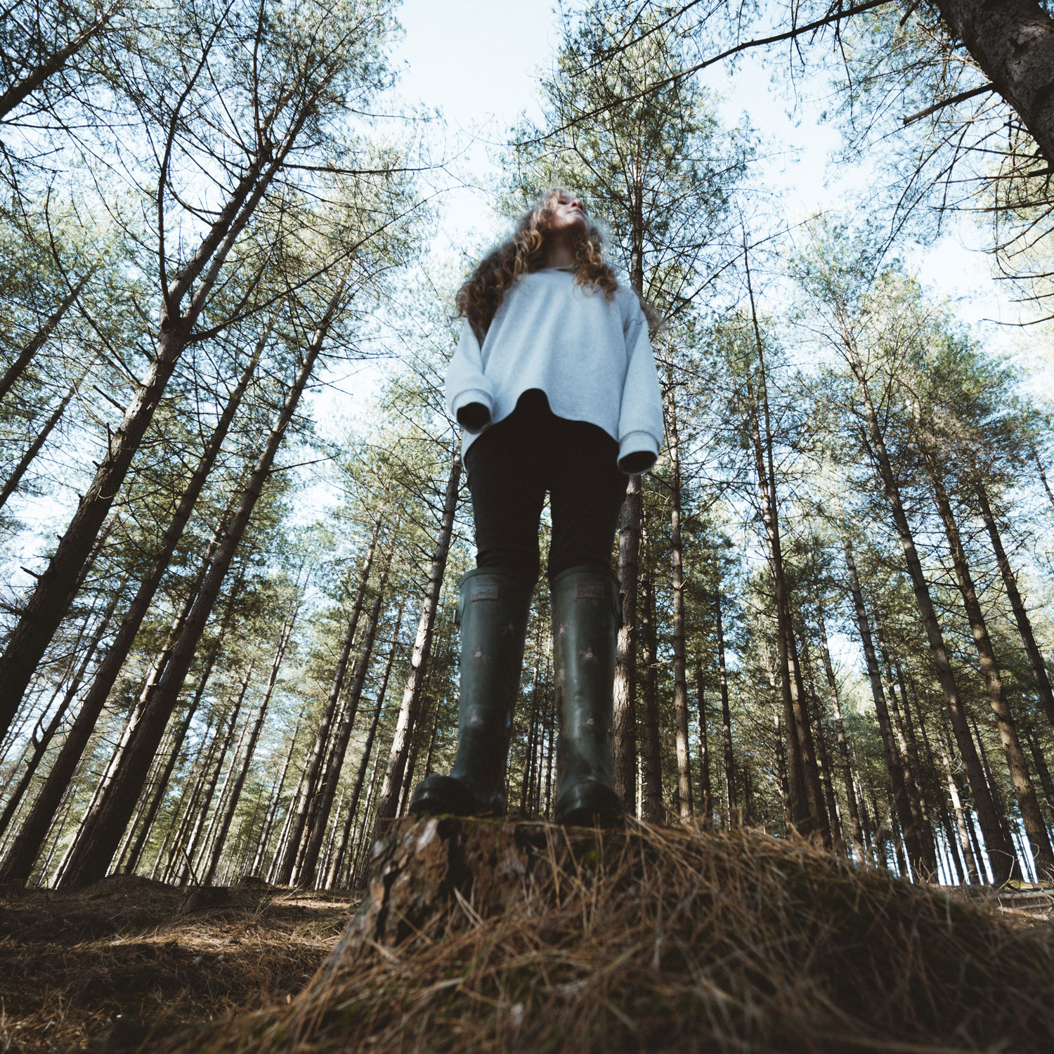 Woman thinking looking out to a lake